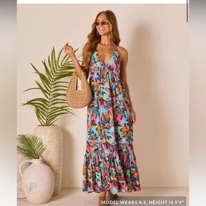 NWT VICI Leniah Tropical Floral Maxi Dress
Vibrant Floral Maxi Dress